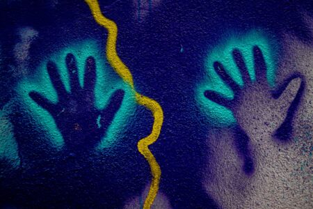 Graffiti depicting the outline of hands